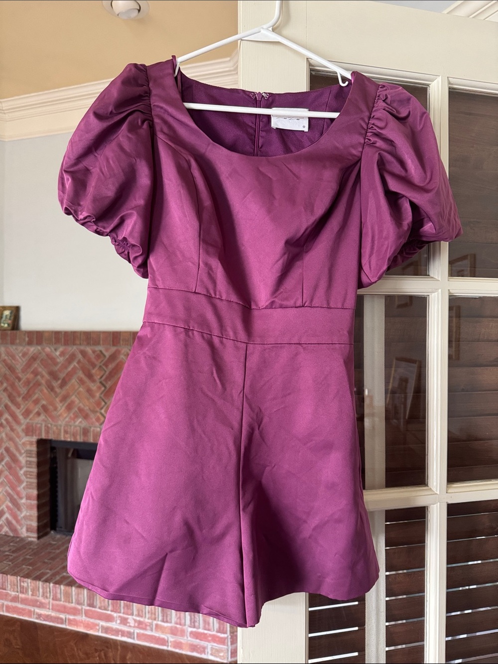 Purple romper with puffy sleeves